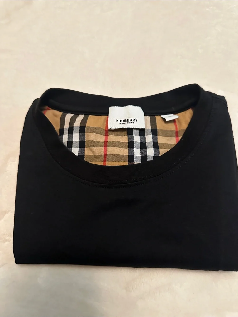 Burberry Black Tee with Tan Plaid Sleeves